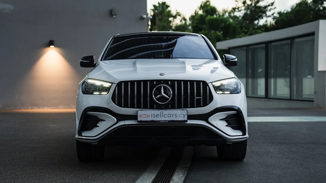Front view with the vertical-slat Panamericana grille. Car 96