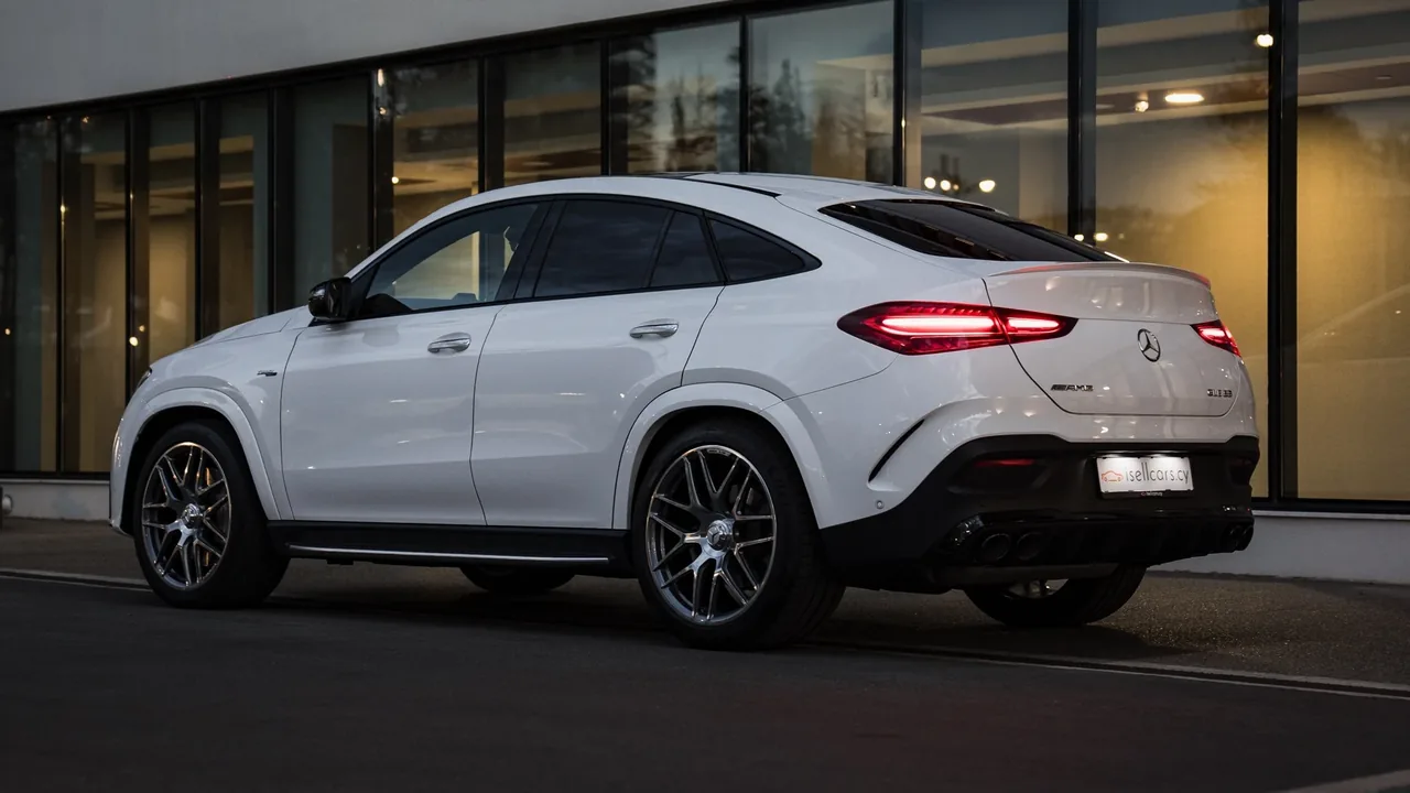 Rear three-quarter view by the glass showroom facade. Car 96