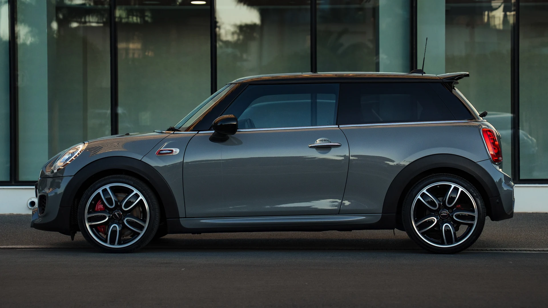 Grey Mini John Cooper Works side profile, two-door body and alloy wheels. Car 78