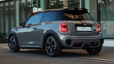 Mini John Cooper Works rear three-quarter, black roof and roof spoiler. Car 78
