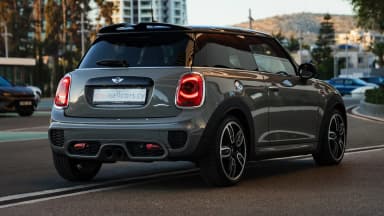 Mini John Cooper Works rear three-quarter, red accent and roof spoiler. Car 78