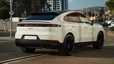 Rear quarter, privacy glass and coupe silhouette. Car 79