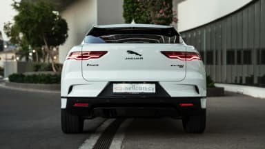 Rear exterior view showing the tail lights and model badge. Car 85
