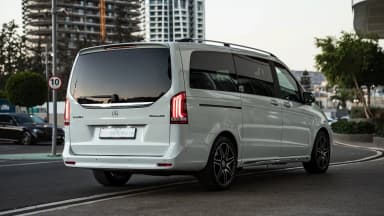 Full side profile exterior view of the van's body and wheelbase. Car 84