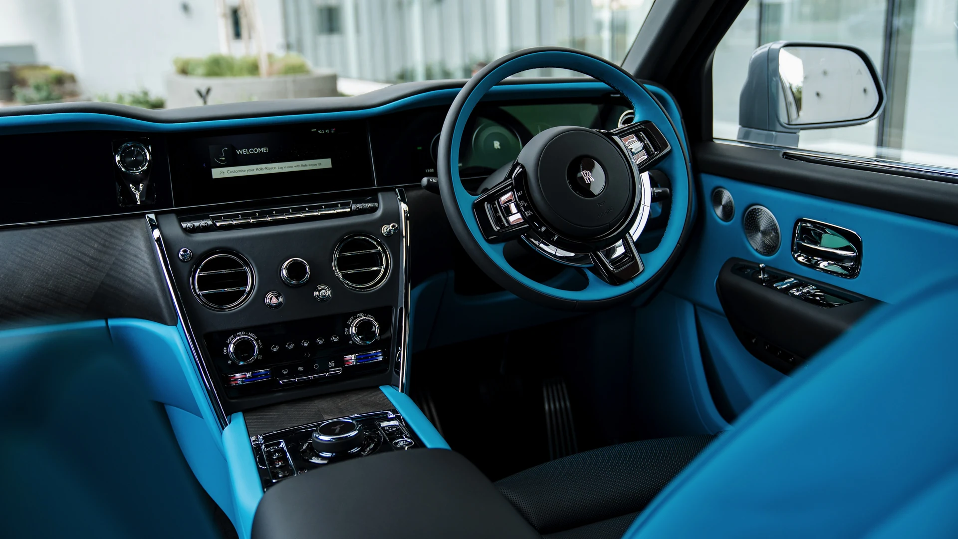 Dashboard from passenger side, full-width trim and air vents. Car 83