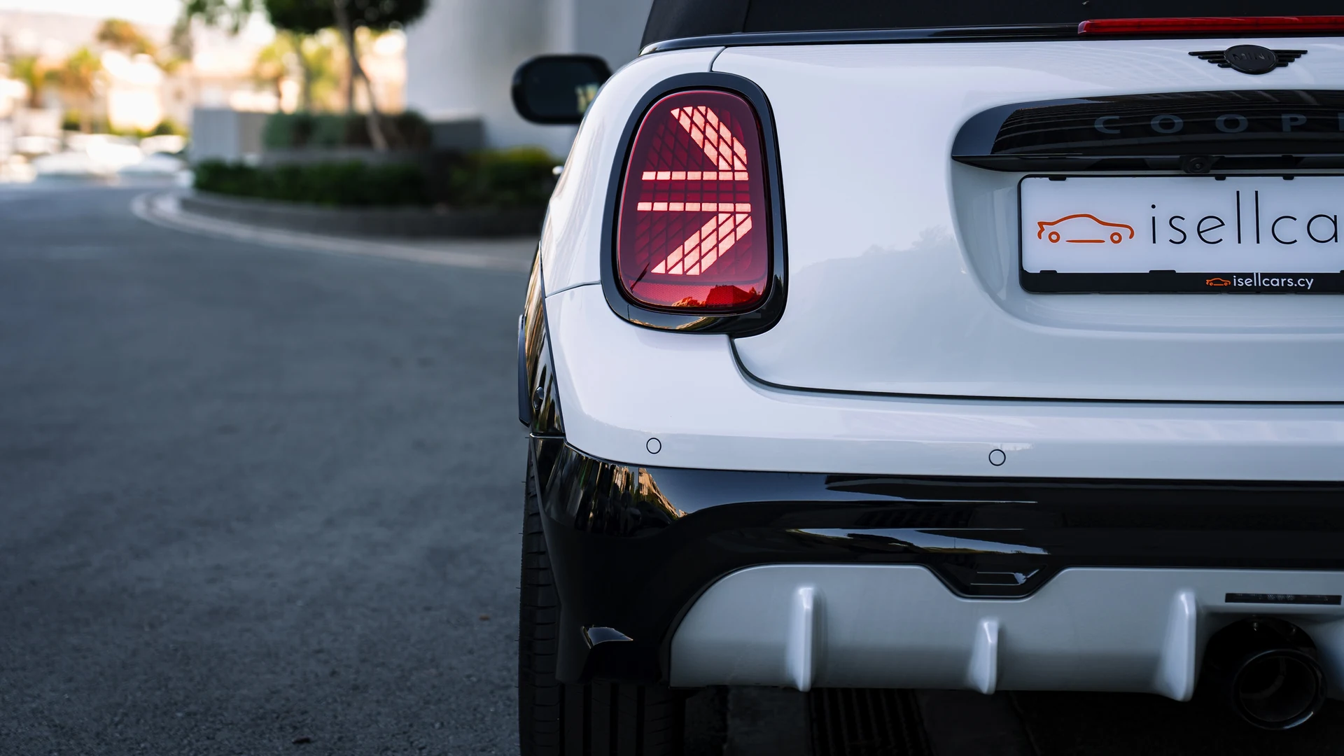 Rear view with isellcars.cy branding plate. Car 81
