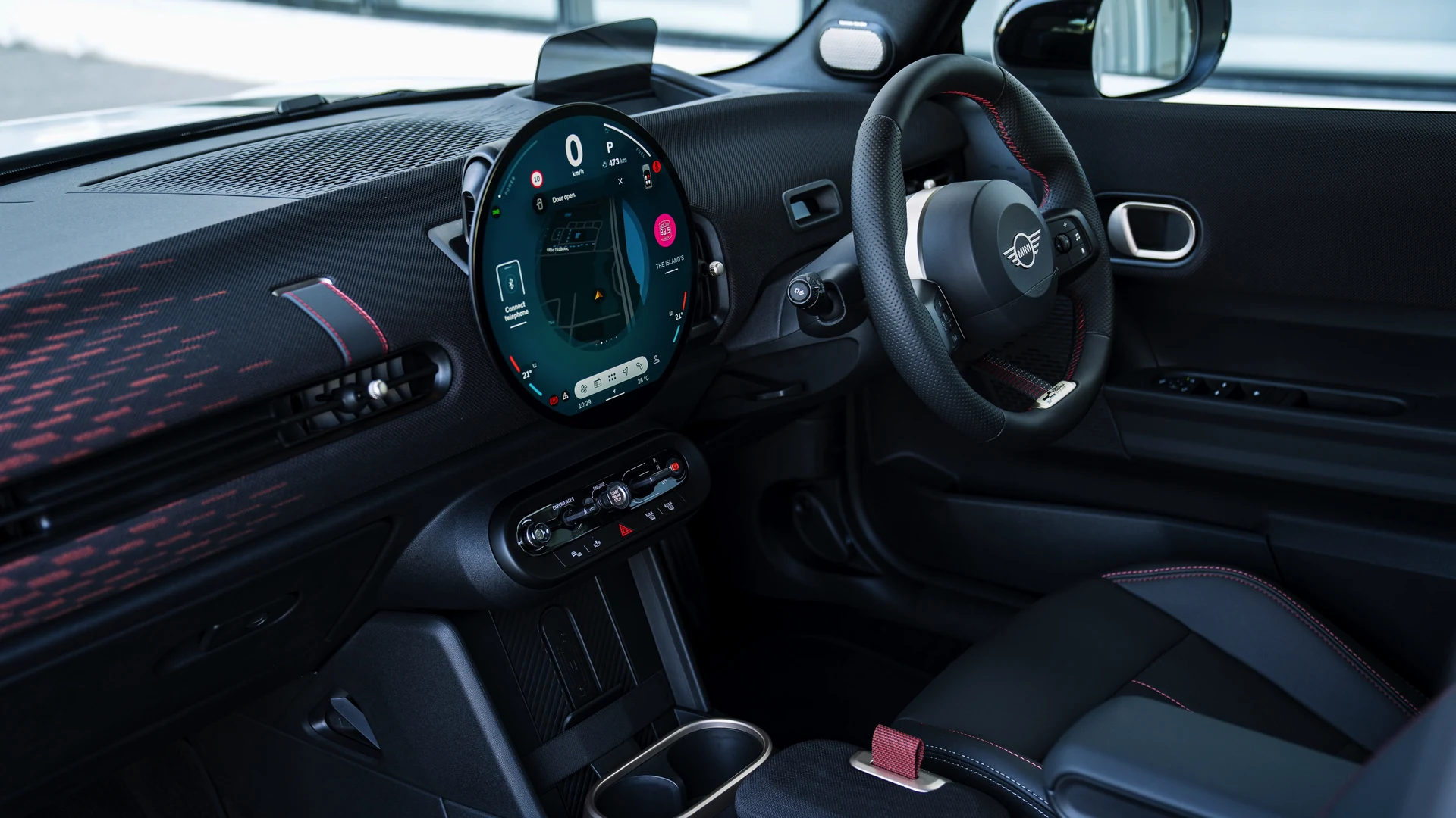 Dashboard, round centre display and toggle switches. Car 81