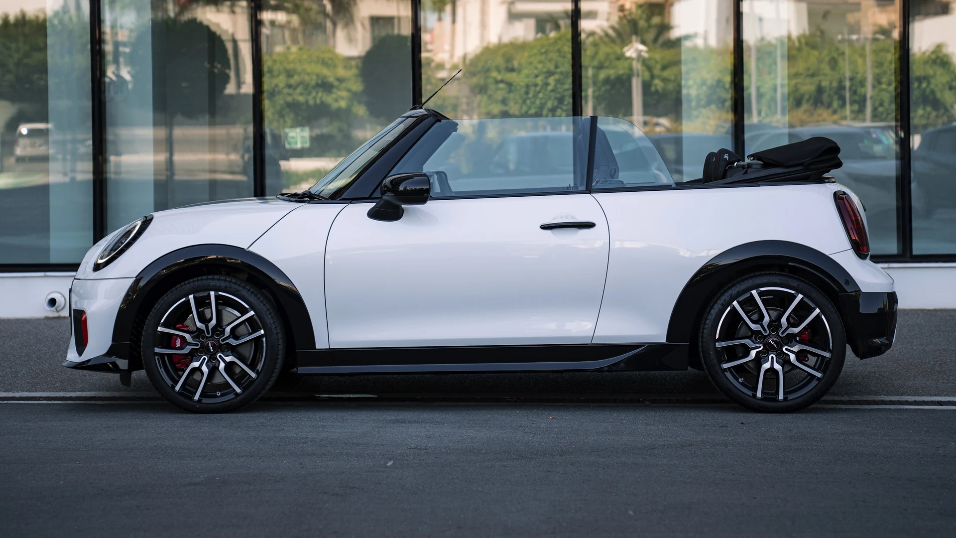 Side profile, roof down, 18-inch JCW wheels. Car 81