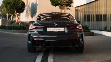 Rear view with the tail lights in evening light. Car 90