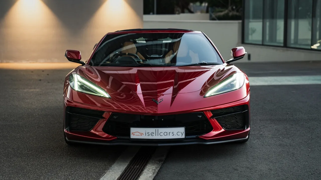 Head-on front view with the roof down and sharp LED headlights. Car 94