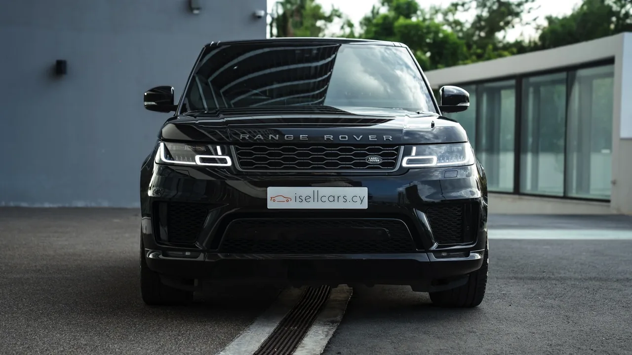 Front view with the gloss black grille and LED headlights. Car 95