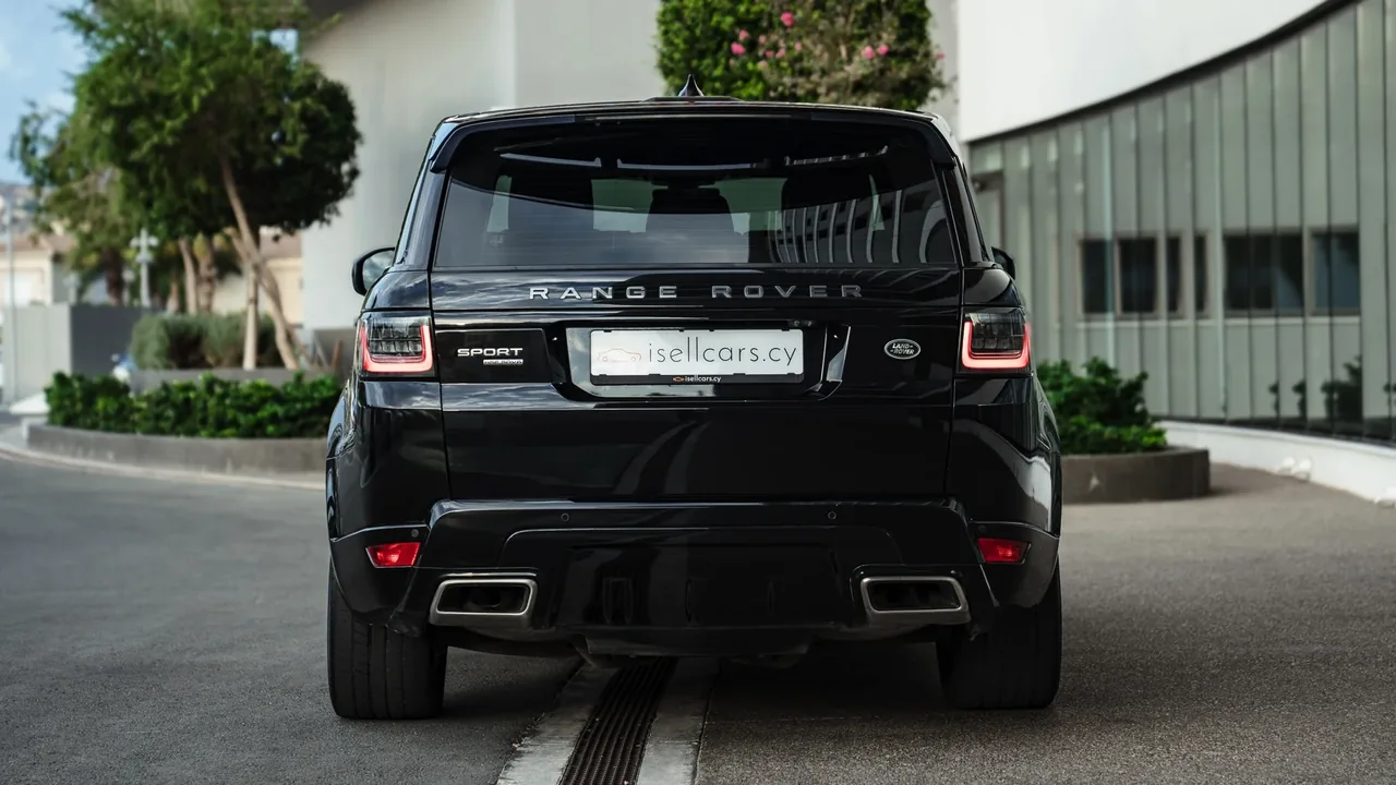 Rear view with tailgate lettering and twin exhaust finishers. Car 95