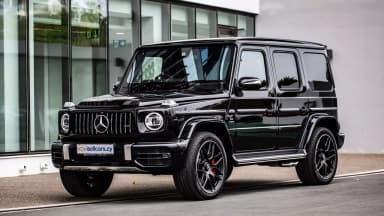 Black SUV, front three-quarter exterior view. Car 8